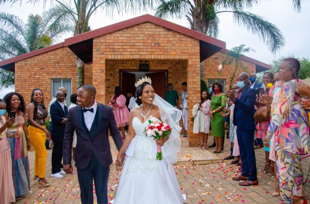 Delighted African couple on their wedding day. Image Source: Unsplash