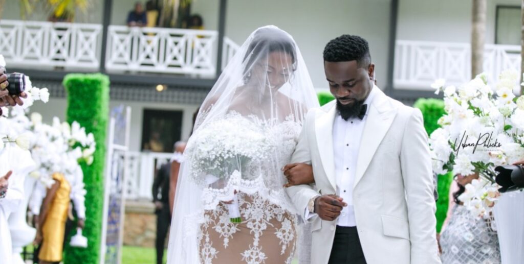 Ghanaian rapper Sarkodie and his wife Tracey Sarkcess on their wedding day. 
