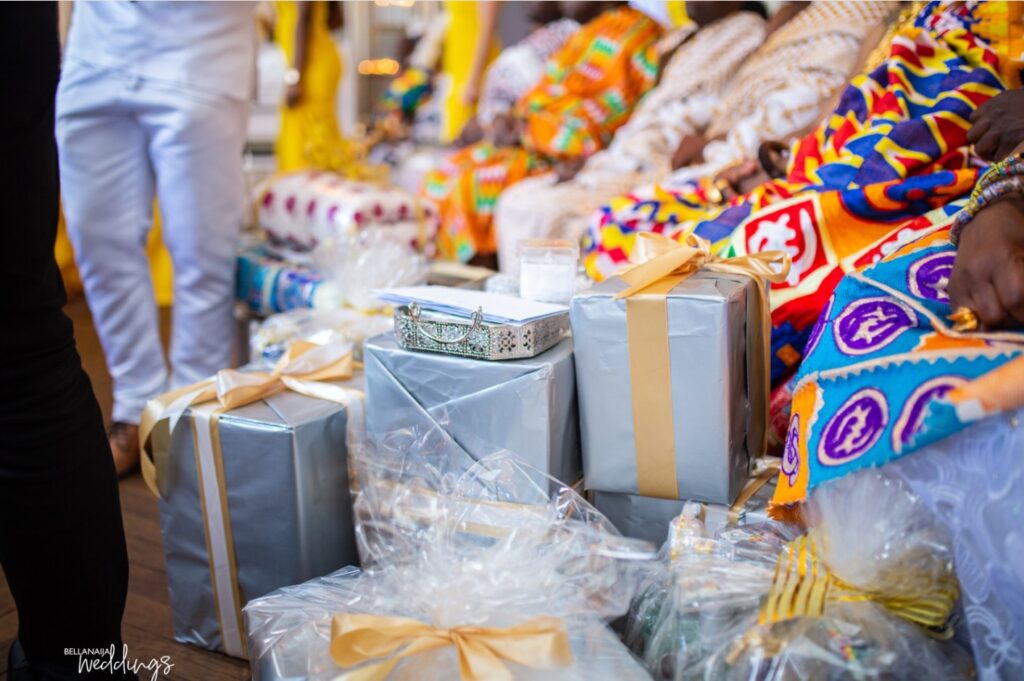 The image shows a dowry presented to the bride and her family at a Ghanaian wedding. Source: bellanaijaweddings