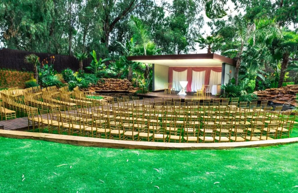 Fitted with beautiful lawns, a bar, spacious parking, and classy washrooms, The Garden is every event organizer's dream. Image Source: thegardenvenue