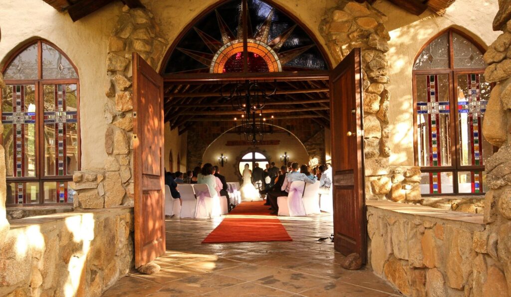 A wedding taking place inside the chapel at eBundu Lodge. Image Source: TripAdvisor