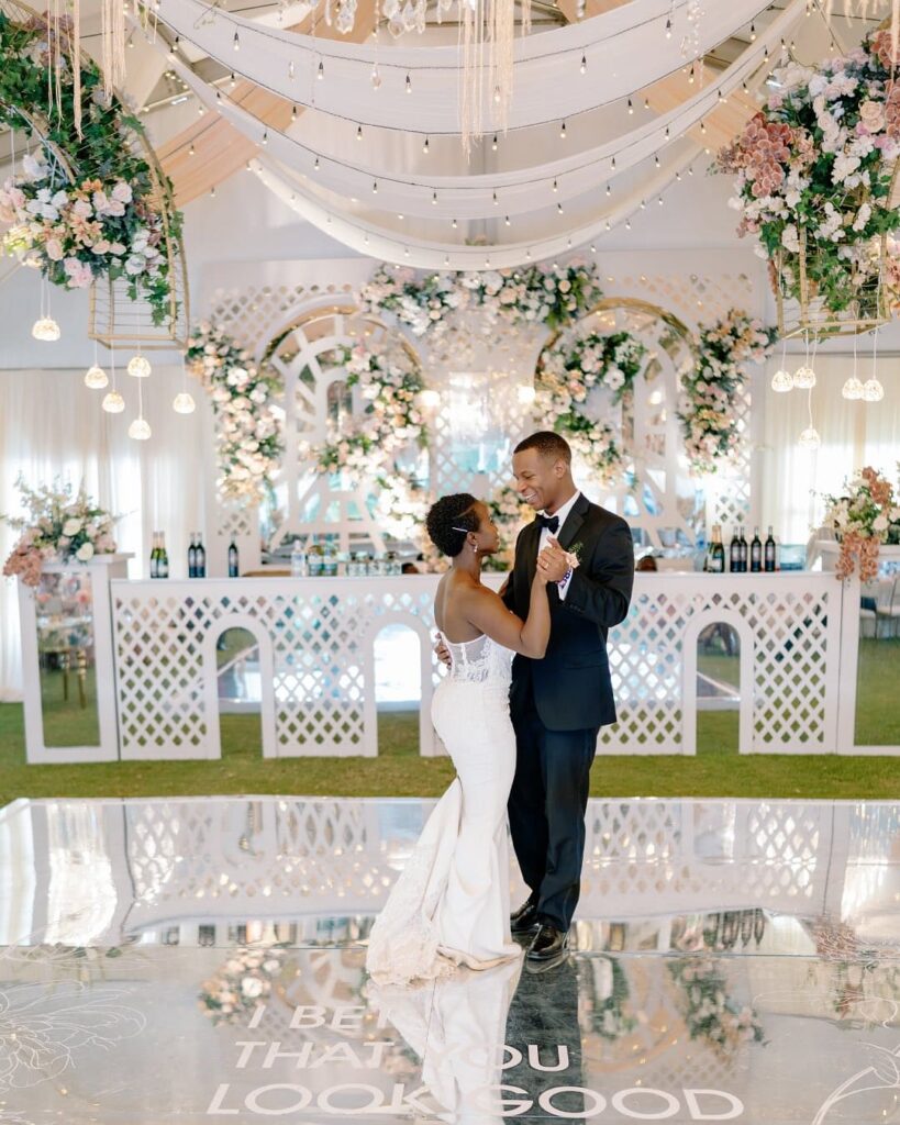 Robert & Makena: A love story, told through stunning flowers, chandeliers, and timeless elegance. Image Source: Instagram/@auraeventplanners