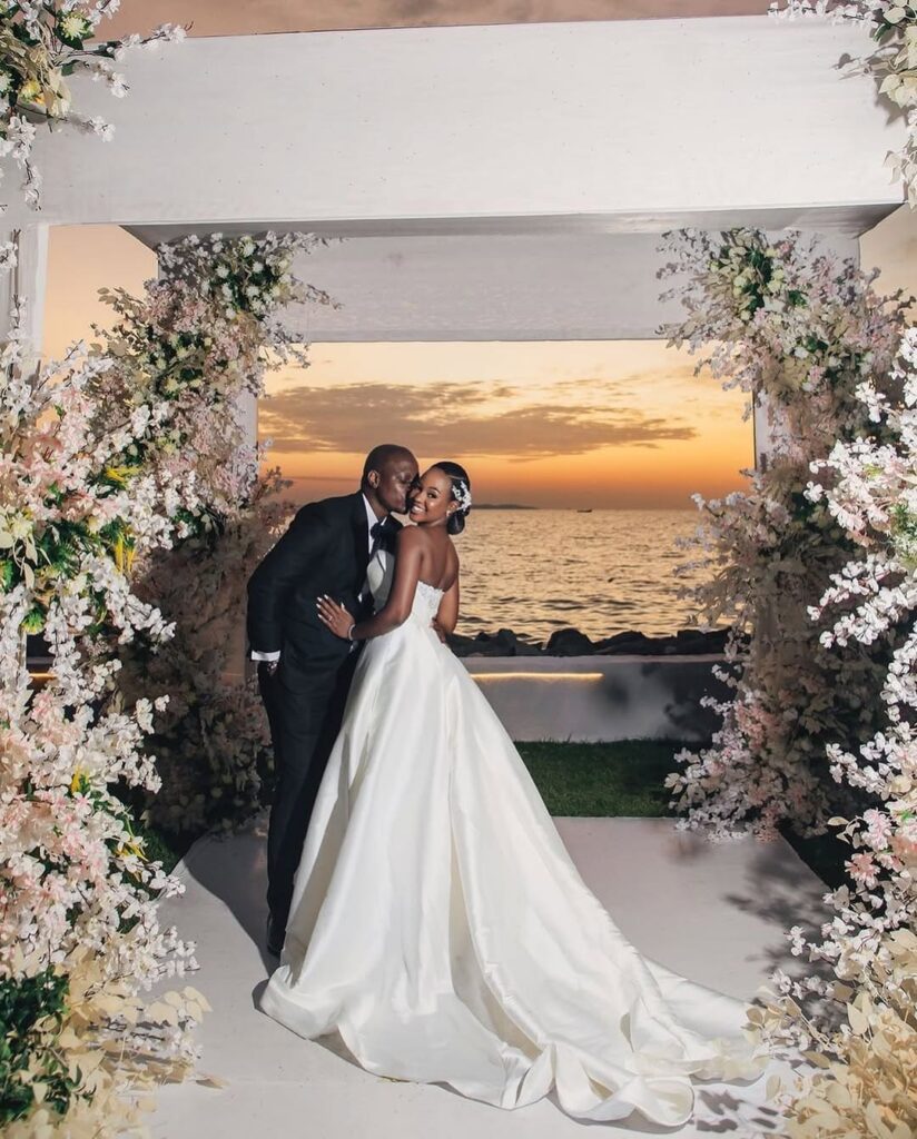 A couple on their wedding day at Malaika Beach Resort. Image Source: Instagram/@malaikabeachresort_tz