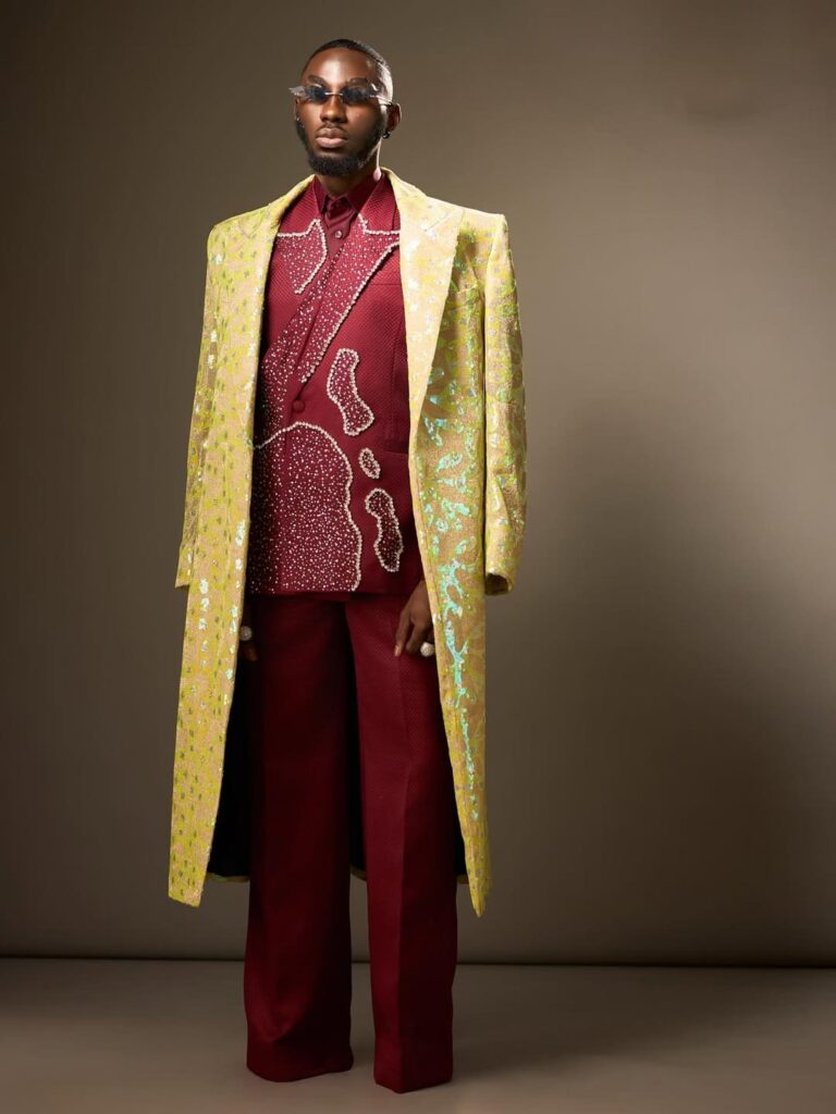 Godwin Armah Nelson is the creative director of Shapes by Nelson, a bridal clothing brand celebrated for its intricately hand-designed embroideries and perfectly matched illusion tulles. Image Source: Instagram/dwin_nelson