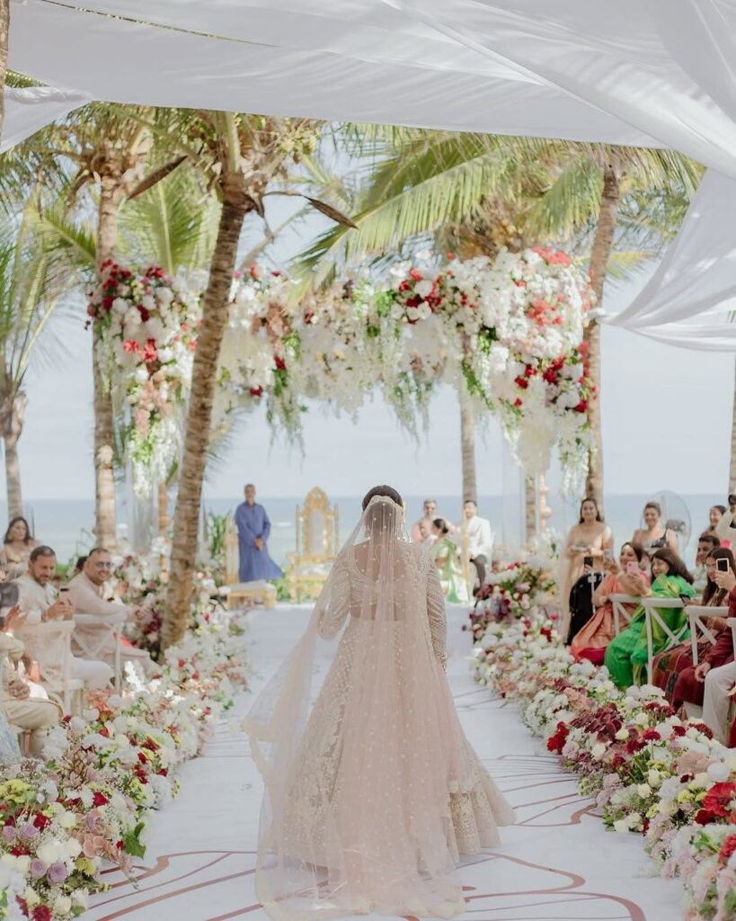 Indian couples on their wedding at the Swahili Beach Resort. Image Source: Instagram/@g_o_l_u_photography_