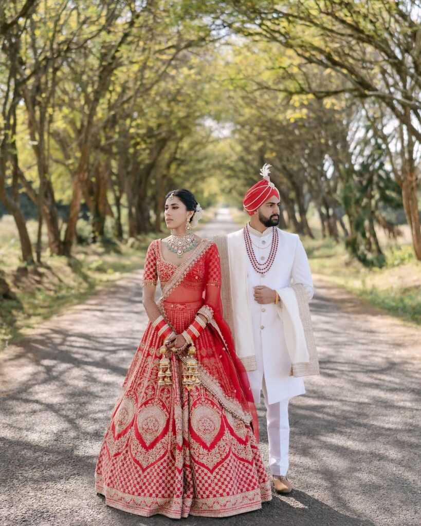 An Indian couple, Reana & Karan, having their wedding in Kenya at the Fairmont Mount Kenya Safari Club. Image Source: Instagram/@feisalsumraphotography