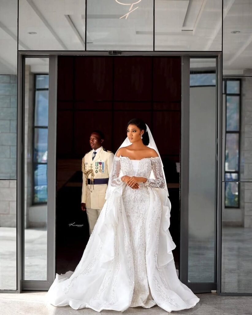 Alheri and Danladi's white wedding. The bride is pictured in her lovely gown from Lacharis Bridal. Image Source: Instagram/@lacharisnigeria