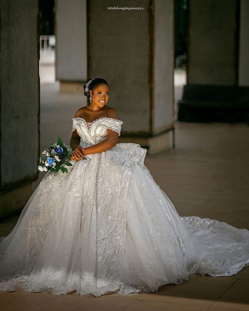 A bride in her wedding dress from Brides On A Budget Nigeria. Image Source: Facebook/@BridesonaBudgetNigeria