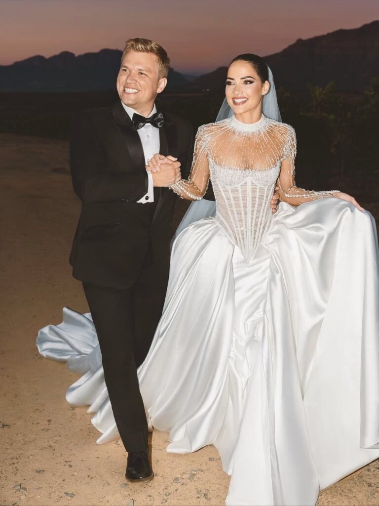 South African model Natasha Joubert and her IT specialist husband, Enrico Vermaak, on their white wedding photographed by Barclay Studios.